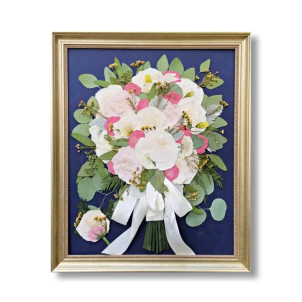 16x20 pressed flower design created from a bride’s wedding bouquet, preserving cherished memories