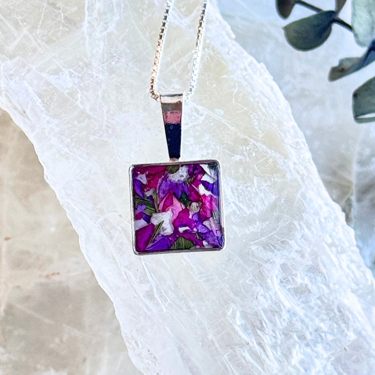 Front view of the Cherished Square Pendant with preserved flowers in sterling silver