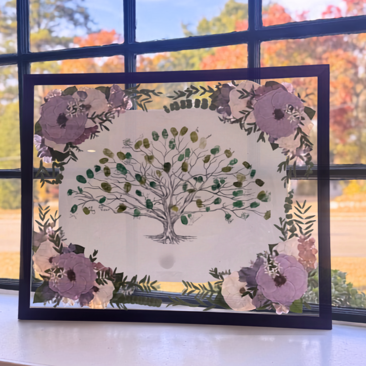 Custom pressed flower artwork incorporating preserved flowers and personalized artwork, handcrafted as a one-of-a-kind design by Cristina at Flowers Forever.