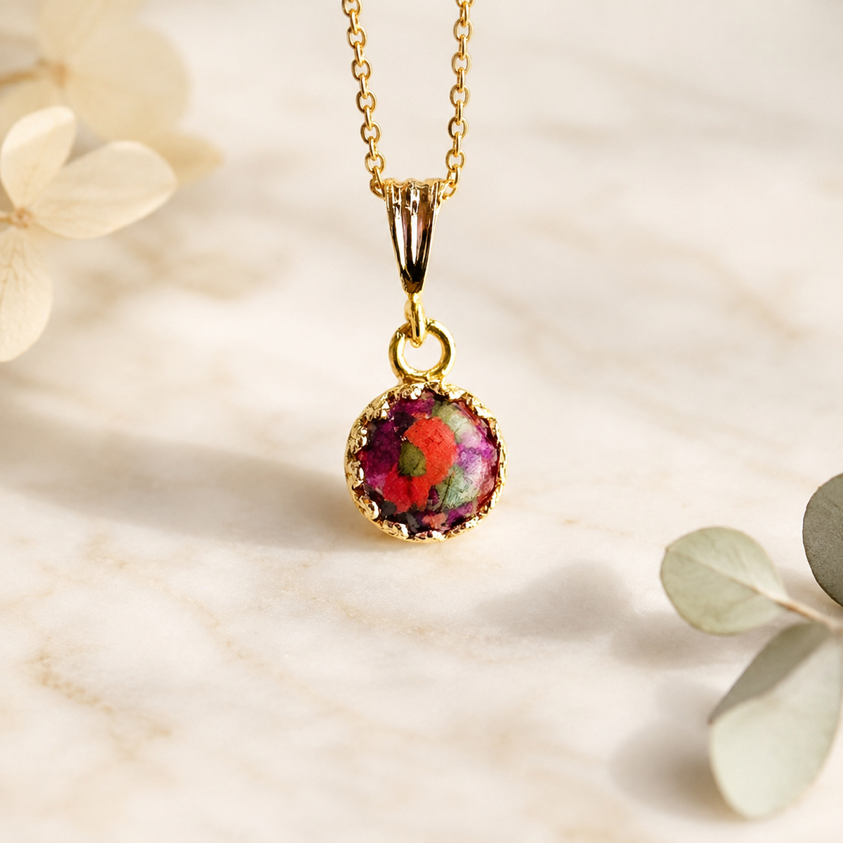 Crown of Memories Pendant in gold handcrafted with preserved wedding flowers, memorial flowers, or funeral flowers in a custom keepsake necklace.