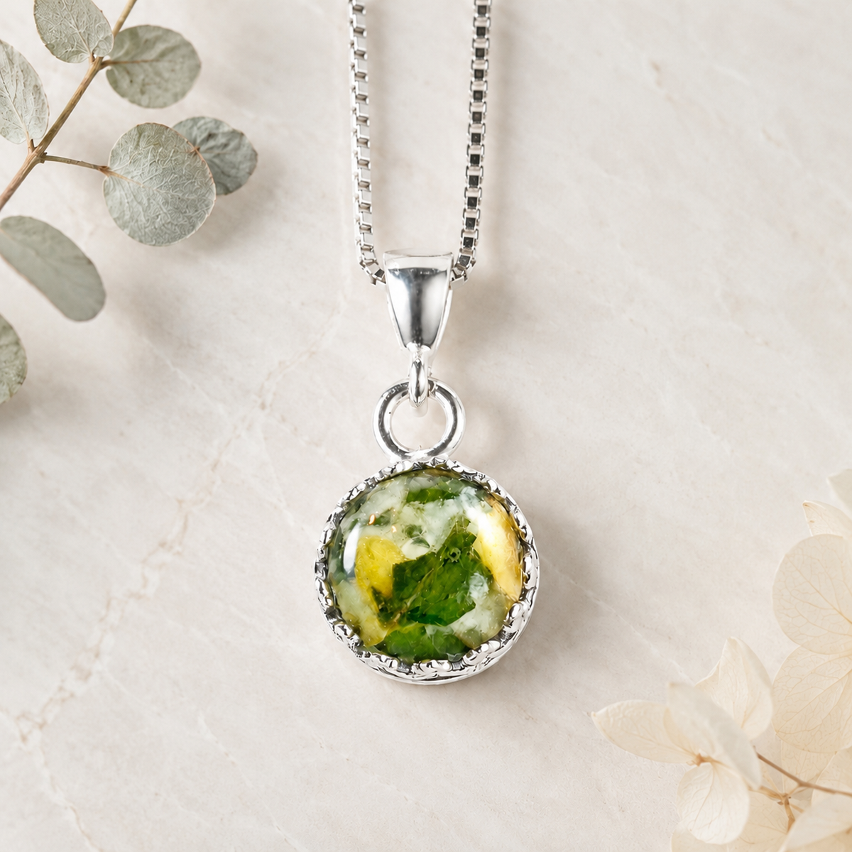Crown of Memories Pendant in sterling silver handcrafted with preserved wedding flowers or funeral flowers, creating a custom memorial keepsake necklace with real flowers, ashes, or hair.
