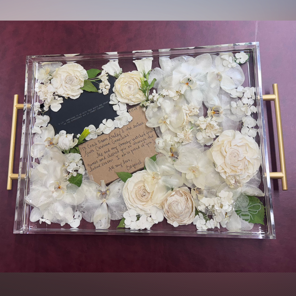 Preserved flowers gifted to Dawn Staley by Beyoncé, beautifully crafted into a keepsake.