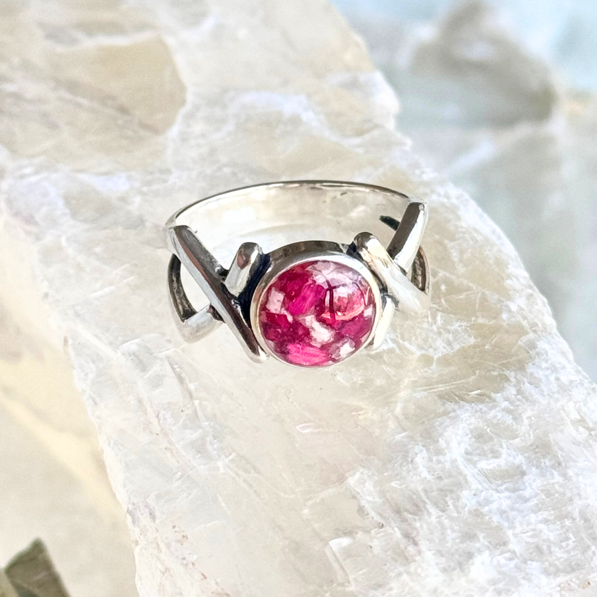 Eternal Memory Ring with preserved flowers from bridal bouquets or memorial flowers, shown in a front view.