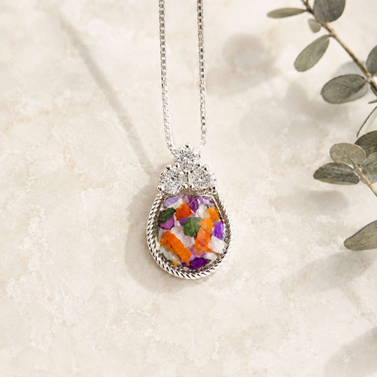 Forever in My Heart Pendant handcrafted in sterling silver with preserved wedding flowers or funeral flowers, creating a custom memorial keepsake necklace with real flowers, ashes, or hair.