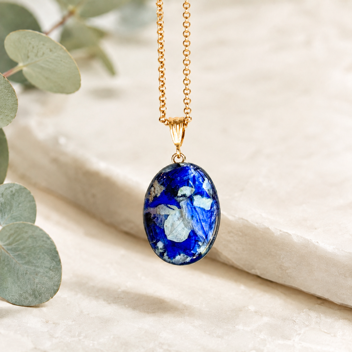 Gold Timeless Floral Keepsake Memorial Pendant handcrafted with preserved wedding flowers or funeral flowers, creating a custom memorial necklace with an elegant oval floral design.