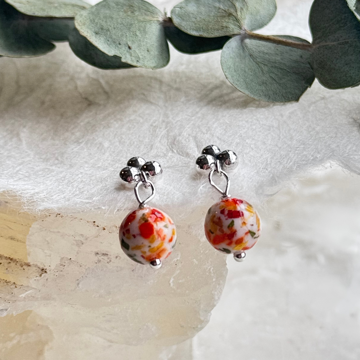  Extra close-up of Graceful Memory Earrings showing floral bead and silver accents