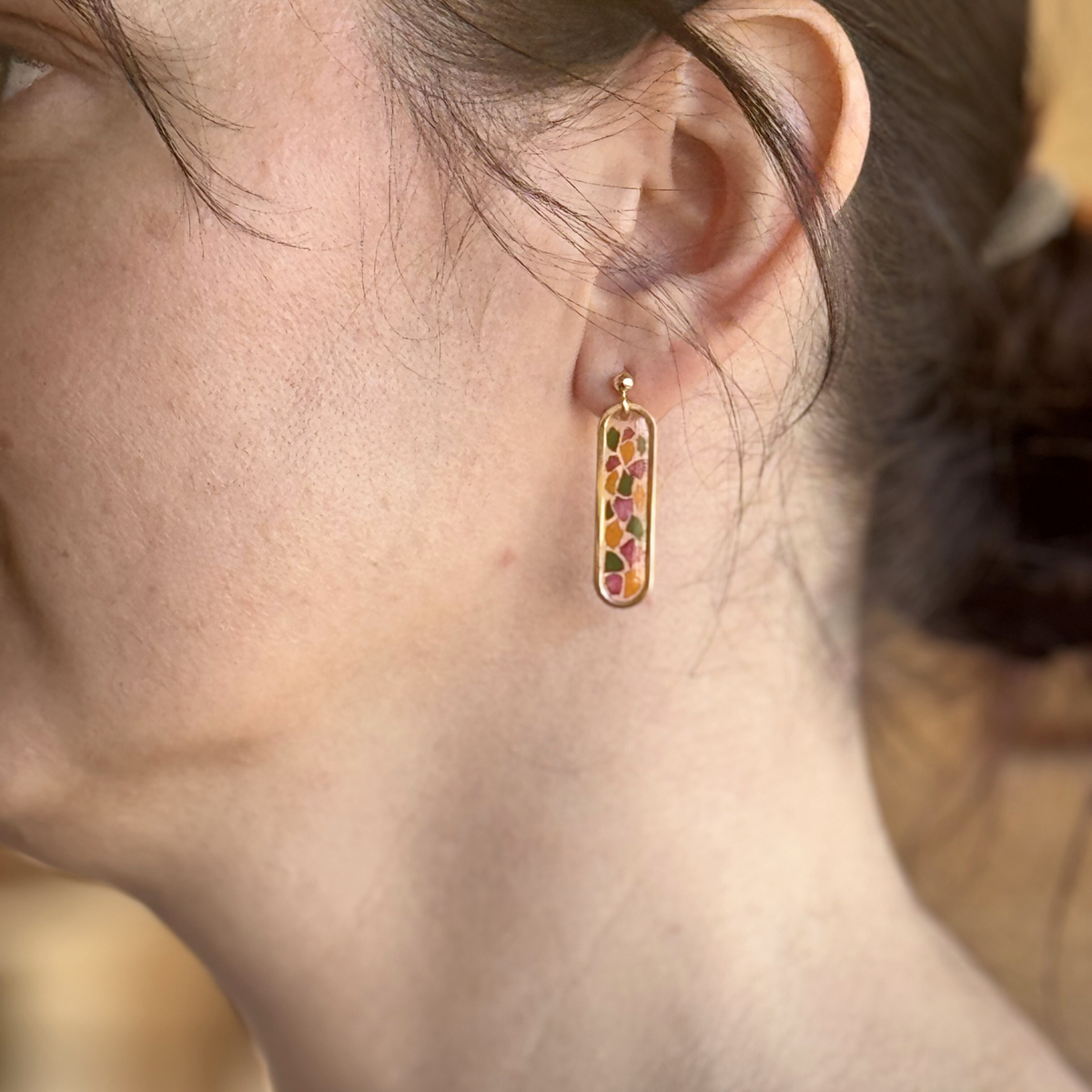 Model wearing Lily Lane Earrings made from real preserved flowers