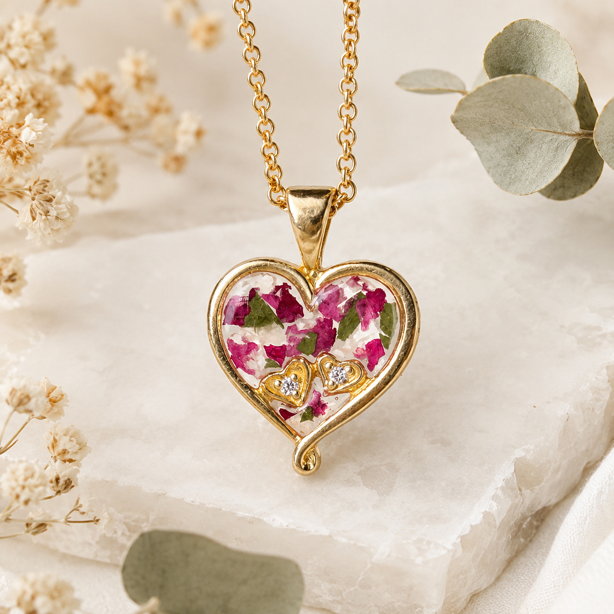 My Heart in Yours Memorial Pendant in gold handcrafted with preserved wedding flowers or funeral flowers, creating a custom memorial keepsake necklace with real flowers, ashes, or hair.