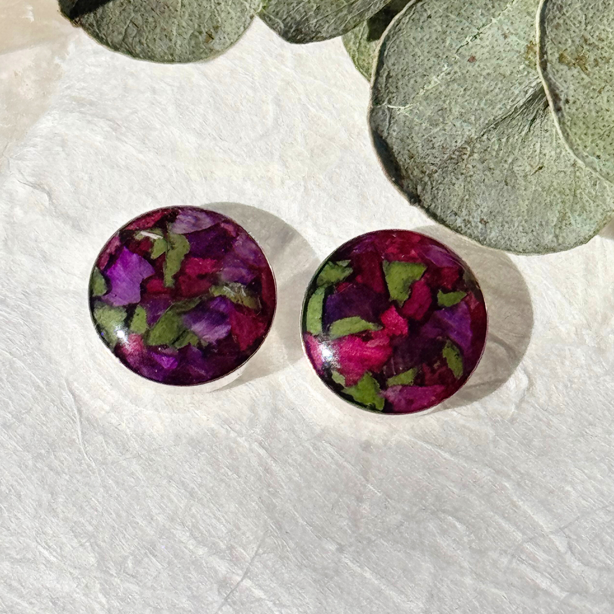 Close-up of Timeless Blossom Stud Earrings showing floral details