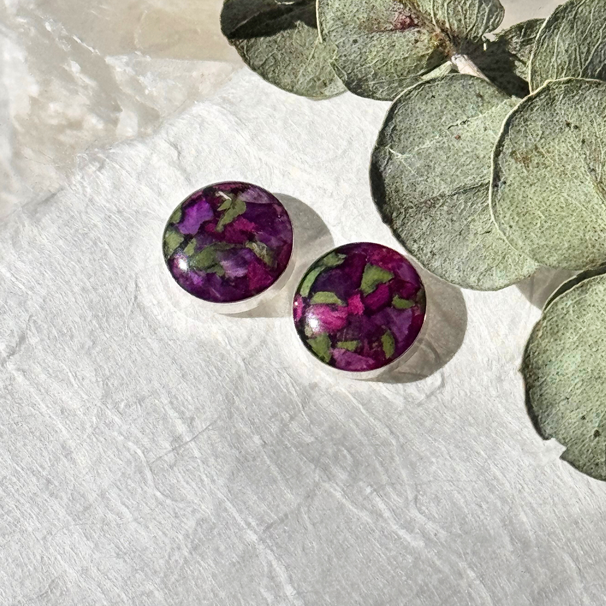 Side view of Timeless Blossom Stud Earrings featuring preserved flowers