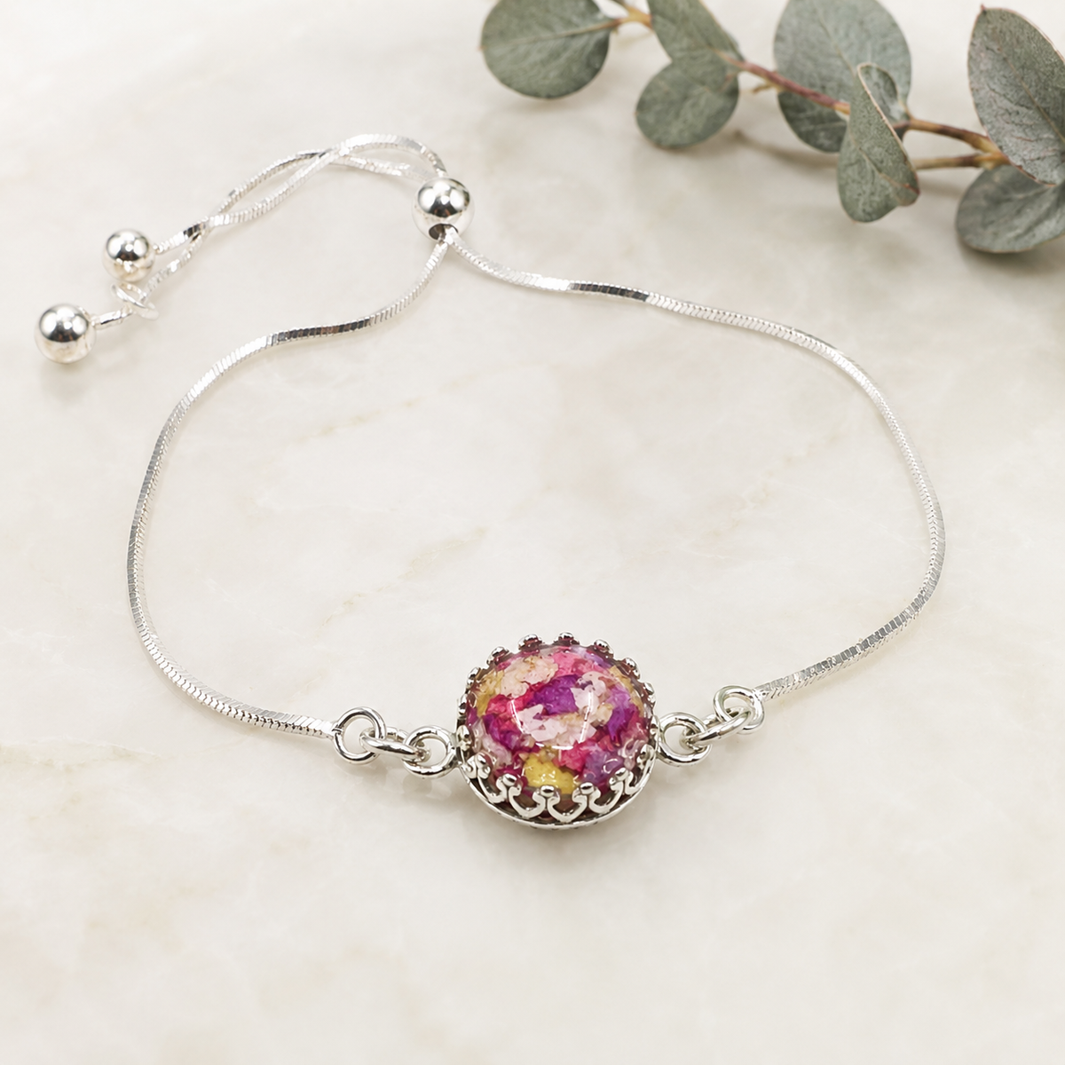 Side view of Blossom of Memories sterling silver flower bracelet.