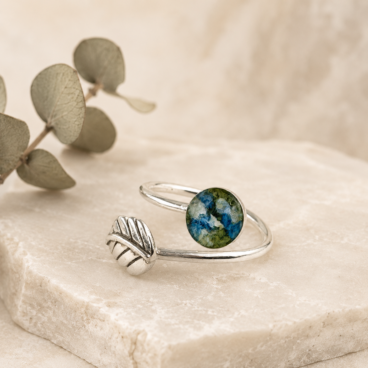Everleaf Keepsake Ring with blue and green preserved flowers in sterling silver.