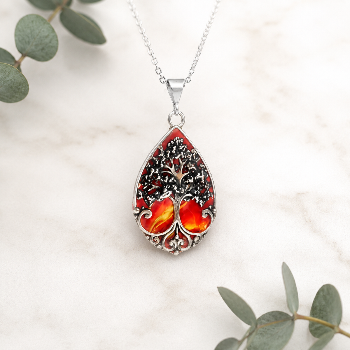 Harper Memorial Pendant with red and orange preserved flowers in a silver tree design.