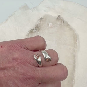 See how the Forever Pawprint Ring looks when worn. This sterling silver memorial ring features your pet’s ashes in the paw design—subtle, meaningful, and always close to you.