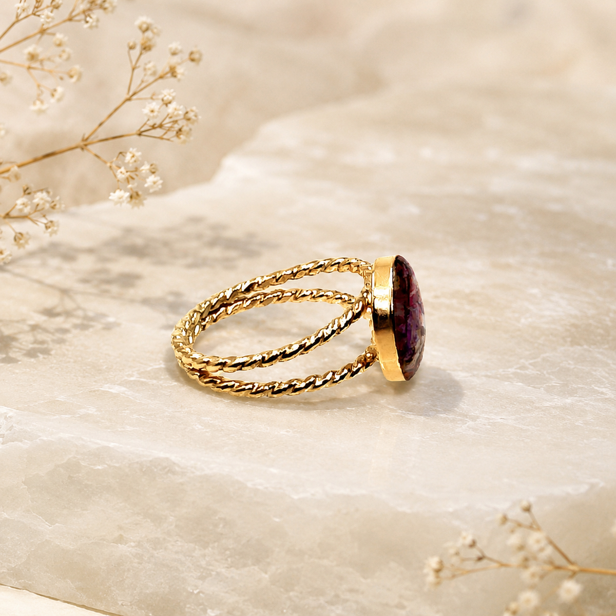Side view of Rosevine Keepsake Ring showing the textured gold band and floral keepsake setting.