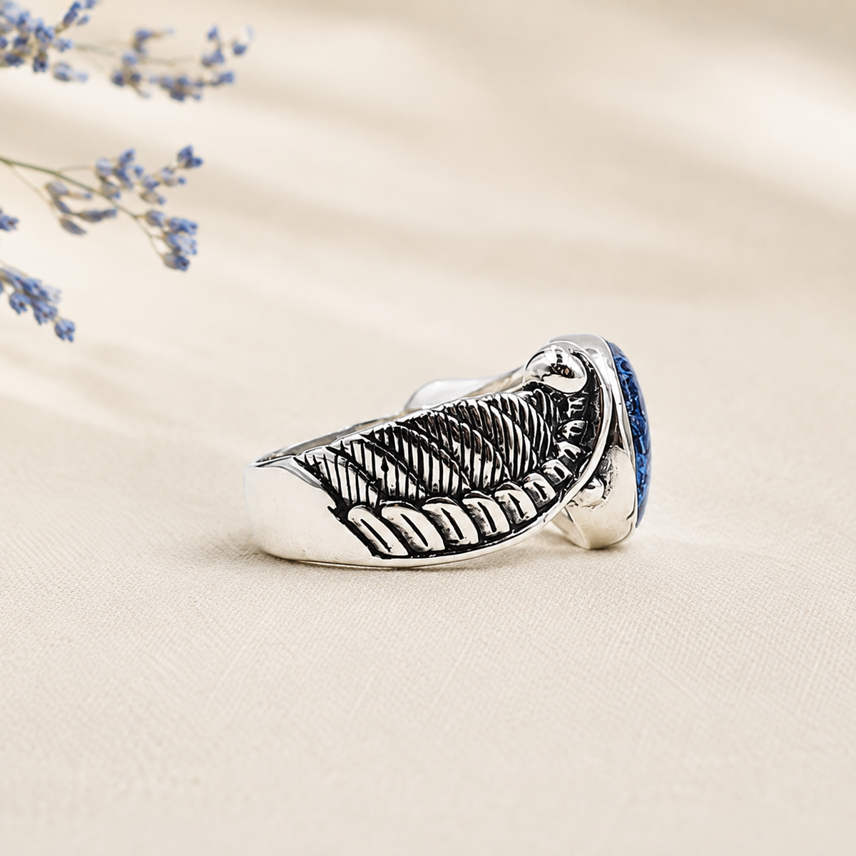 Side view of Seraphina Memorial Ring showing the silver leaf detail.