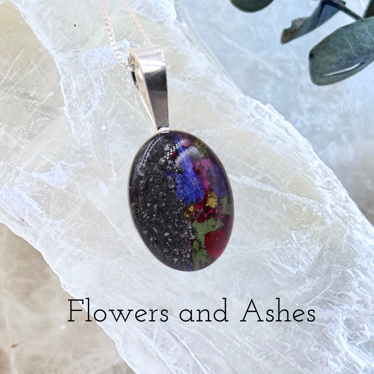 Timeless Floral Keepsake with preserved flowers and ashes in an oval pendant.