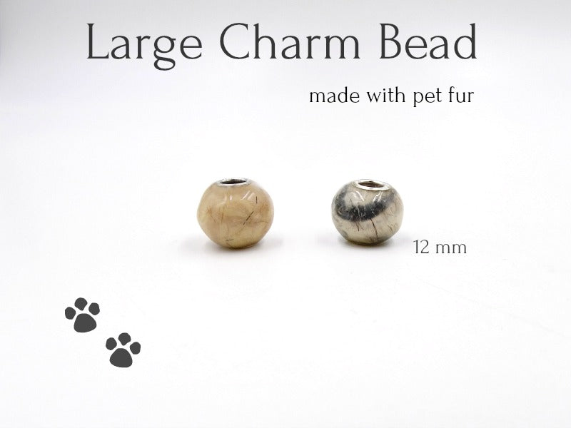 A size comparison of the 12mm Forever Fur Memorial Beads, showcasing their pet resemblance design and cremation ash infusion.