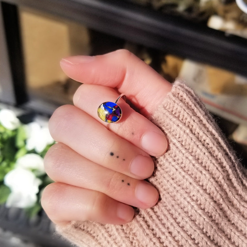 Model wearing the Luna Bloom Ring, handcrafted with real preserved flowers from a bridal bouquet or memorial arrangement.