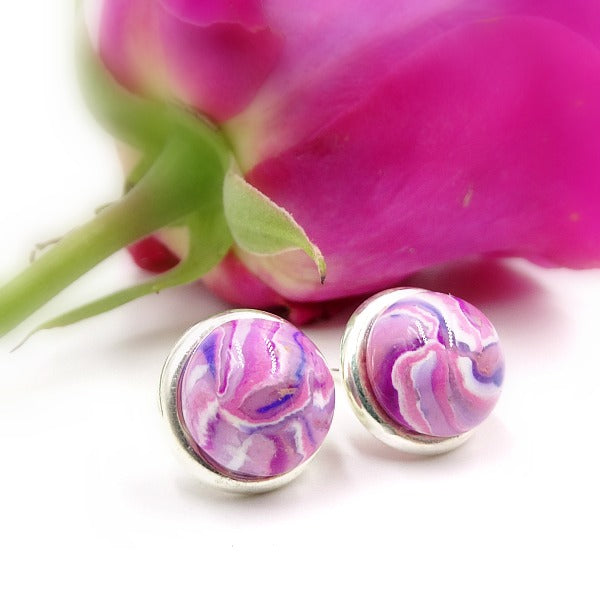 Round Sterling silver earrings with pink, white, and blue clay swirled with flowers.