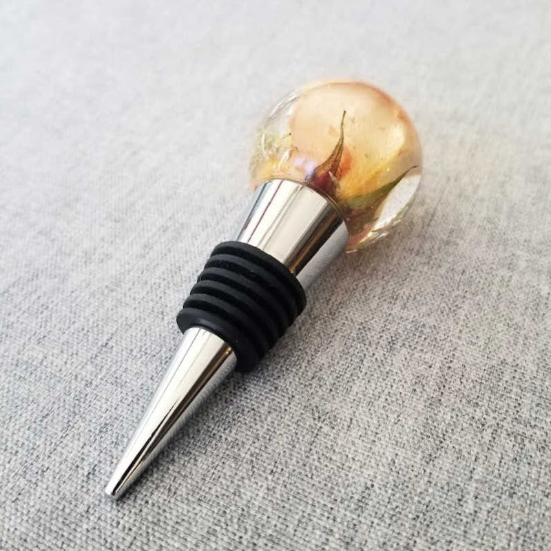 Side view of wine stopper showing length and insert depth, highlighting how it fits securely into a wine bottle.